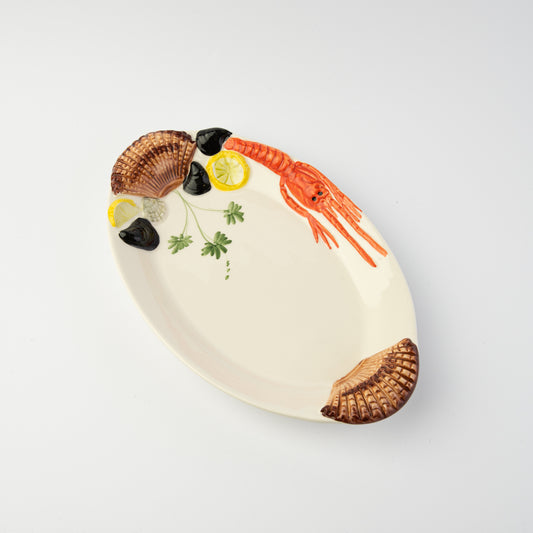Ovale pesce e conchiglie grande